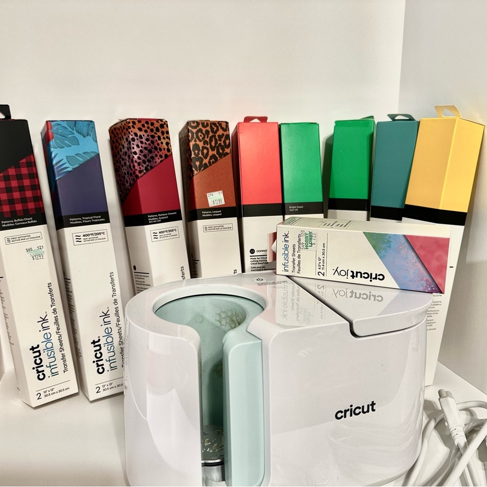 Cricut Mug Press +11 free invisible ink  & a few already opened.